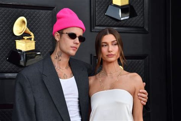 Hailey Bieber rocks a &rsquo;90sinspired look with a sheer slip dress and